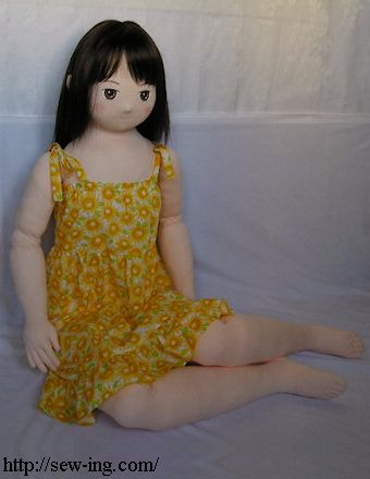 Girl doll in sundress